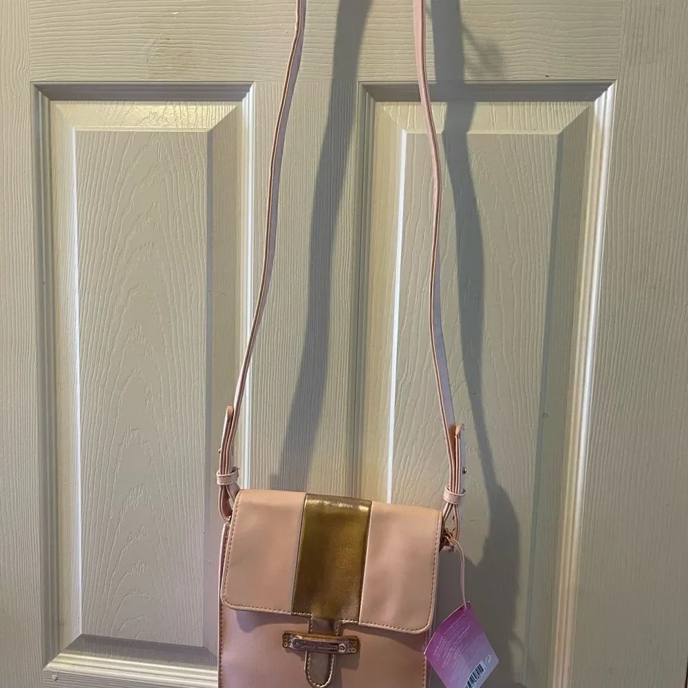 Juicy Couture pink and gold synthetic leather crossbody bag.